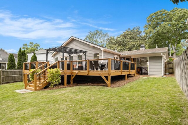 back of house with a wooden deck, a pergola, a fenced backyard, a chimney, and a lawn