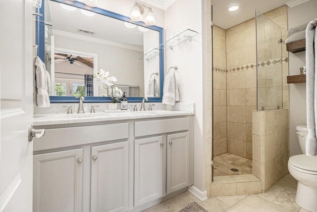 bathroom featuring visible vents, a sink, and crown molding