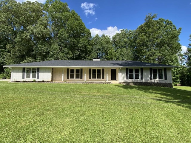 3975 N Sharon Church Rd N, Loganville, GA 30052 - ranch-style house with brick siding, a front lawn, and a chimney