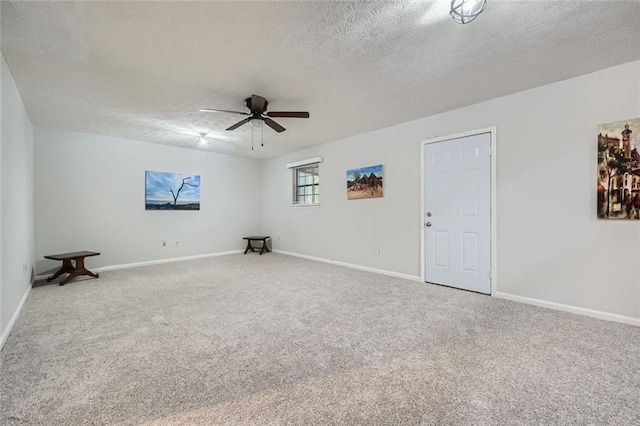 6118 Dana Ct, Lithonia, GA 30058 - empty room with a textured ceiling, a ceiling fan, and carpet floors