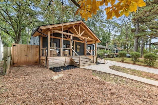 410 Wilkinson Dr SE, Atlanta, GA 30317 - view of front of home featuring covered porch and fence