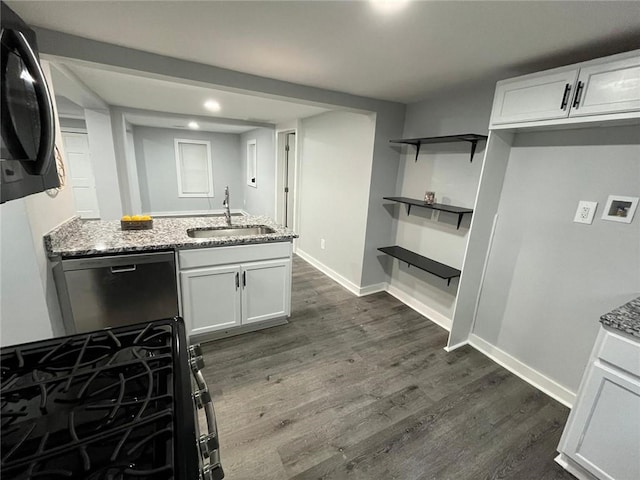 2040 Penelope St NW, Atlanta, GA 30314 - kitchen with a sink, dishwasher, gas stove, light stone countertops, and dark wood-type flooring