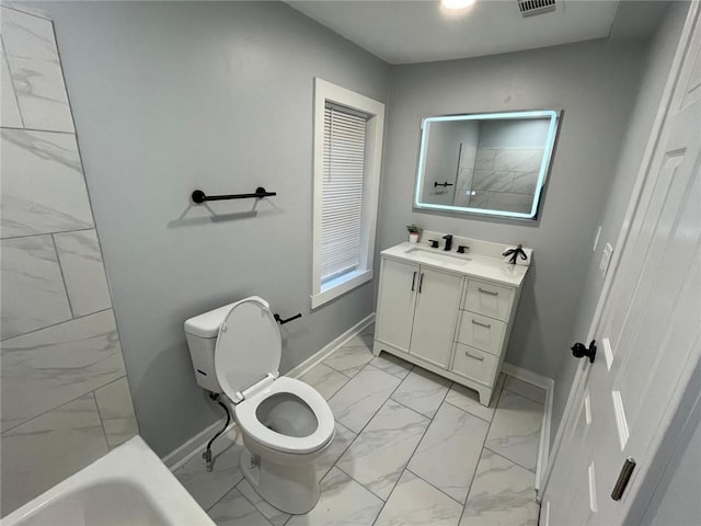 2040 Penelope St NW, Atlanta, GA 30314 - full bathroom with marble look tiles, baseboards, vanity, and toilet