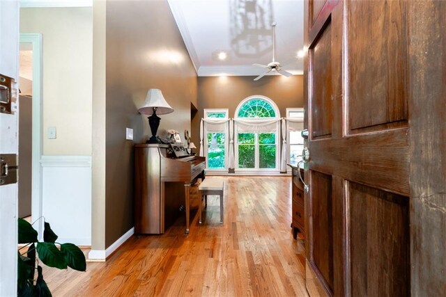 living room featuring hardwood / wood-style flooring and a brick fireplace