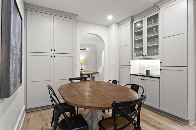 dining space with light hardwood / wood-style flooring