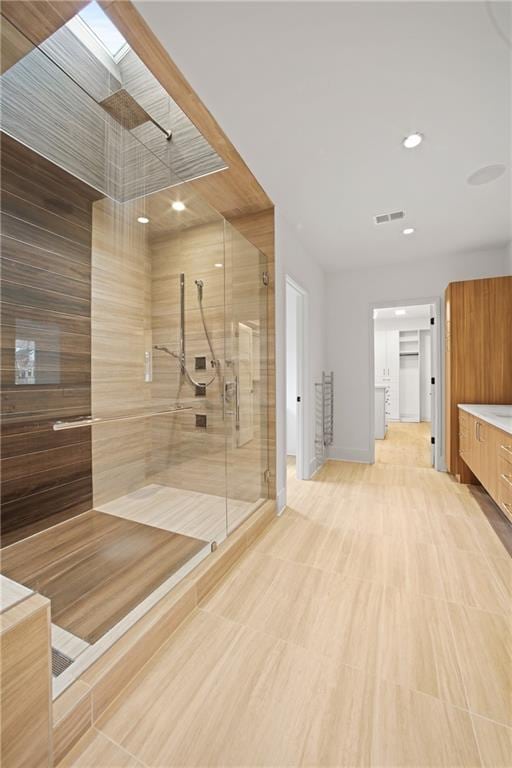 1103 Lynmoor Dr NE, Brookhaven, GA 30319 - bathroom with vanity and a shower with door