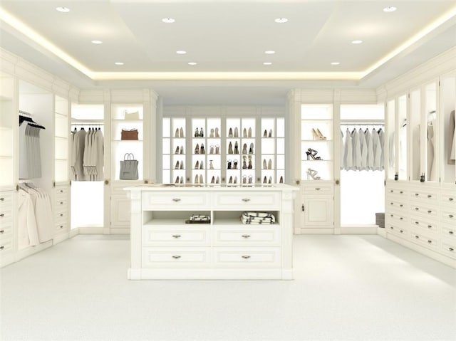 1103 Lynmoor Dr NE, Brookhaven, GA 30319 - spacious closet featuring a raised ceiling and light colored carpet