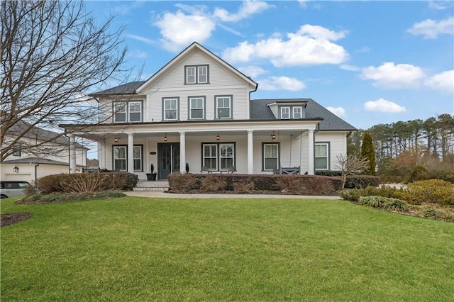 view of front of house featuring covered porch and a front lawn