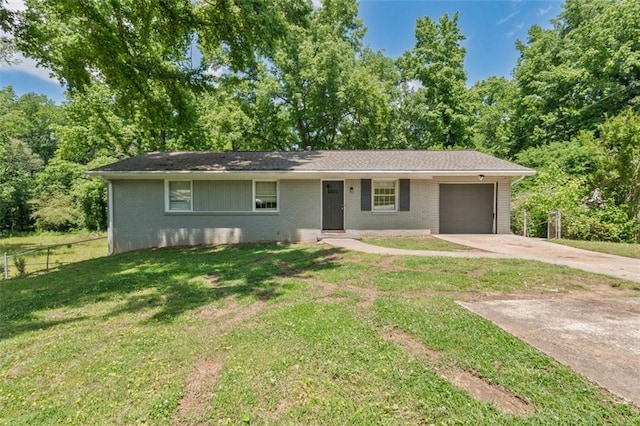 2172 SE Wakita Dr SE, Marietta, GA 30060 - ranch-style home featuring a garage, brick siding, and concrete driveway