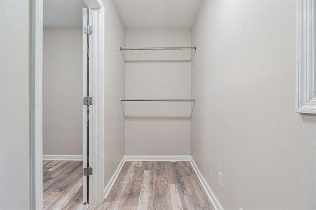2172 SE Wakita Dr SE, Marietta, GA 30060 - spacious closet featuring wood finished floors