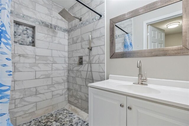 2172 SE Wakita Dr SE, Marietta, GA 30060 - full bathroom featuring vanity and a tile shower