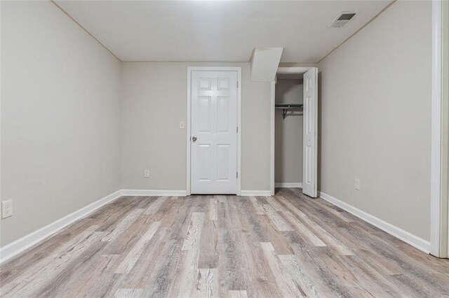 2172 SE Wakita Dr SE, Marietta, GA 30060 - unfurnished bedroom with light wood finished floors, baseboards, and a closet