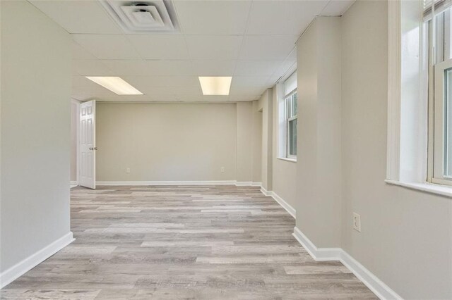 2172 SE Wakita Dr SE, Marietta, GA 30060 - empty room with light wood-type flooring, a drop ceiling, and baseboards