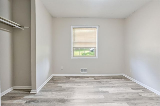 2172 SE Wakita Dr SE, Marietta, GA 30060 - spare room featuring light wood finished floors and baseboards