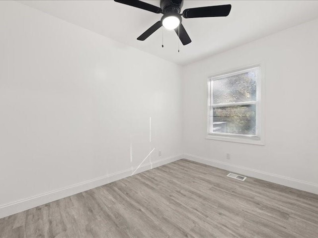 unfurnished room featuring ceiling fan and light hardwood / wood-style flooring