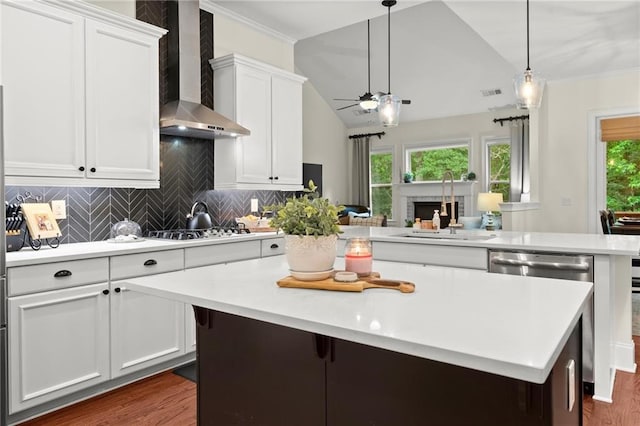 4896 Locklear Way, Marietta, GA 30066 - kitchen with a sink, wall chimney range hood, a center island, light countertops, and dark wood-type flooring