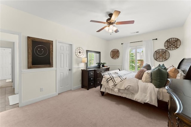 4896 Locklear Way, Marietta, GA 30066 - carpeted bedroom with a ceiling fan and baseboards