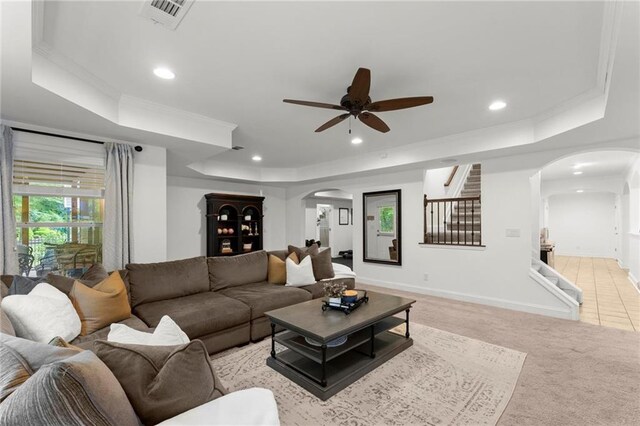 4896 Locklear Way, Marietta, GA 30066 - living area with arched walkways, a raised ceiling, ceiling fan, recessed lighting, and stairs