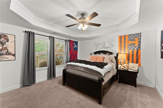 4896 Locklear Way, Marietta, GA 30066 - carpeted bedroom featuring a tray ceiling, crown molding, baseboards, and ceiling fan