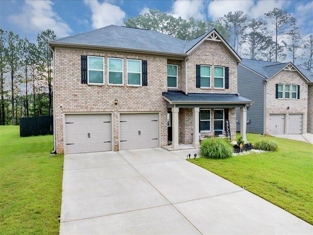 craftsman inspired home featuring an attached garage, a porch, concrete driveway, and brick siding