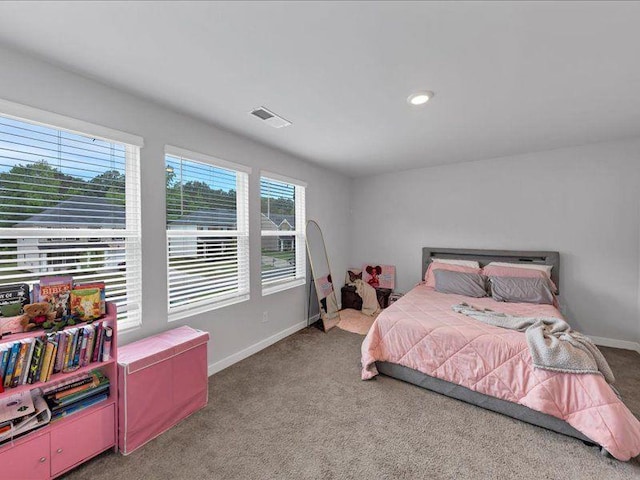 carpeted bedroom with baseboards and recessed lighting