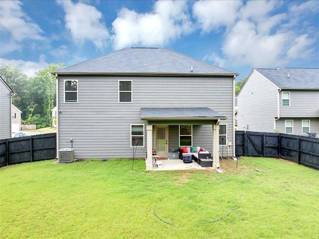 back of property with a patio area, an outdoor living space, and central AC unit