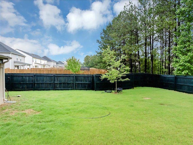 view of yard with a residential view