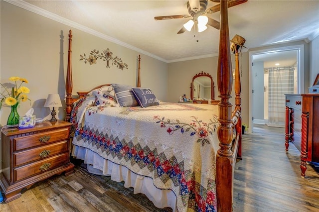 bedroom with ceiling fan, ornamental molding, and dark wood-style flooring