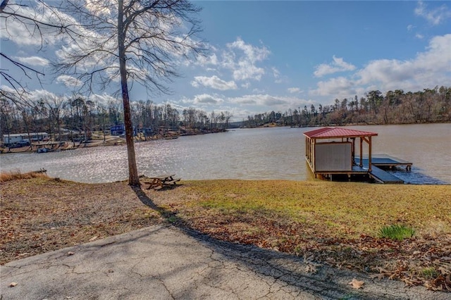 exterior space with a water view