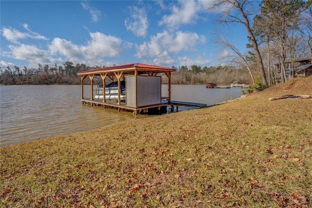 view of dock featuring a water view and boat lift