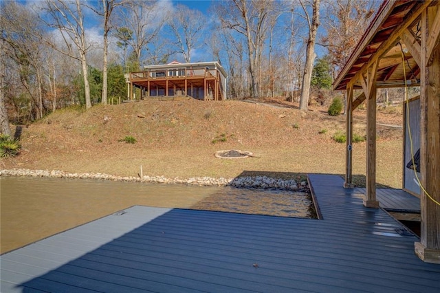 deck featuring a water view