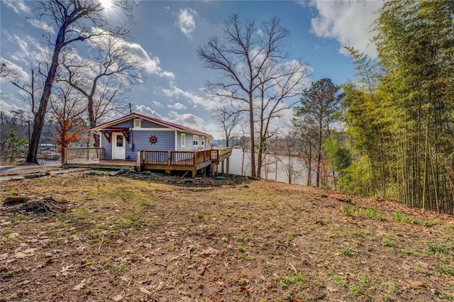 view of yard featuring a wooden deck