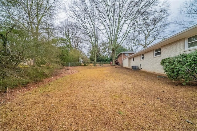 view of yard with central AC