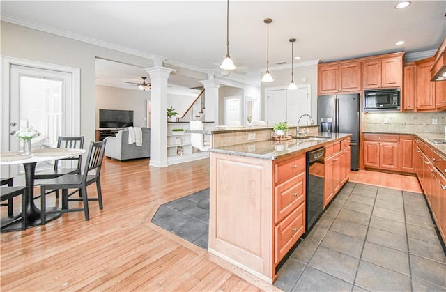 55 Little Barley Ln, Grayson, GA 30017 - kitchen featuring ornate columns, black appliances, a sink, crown molding, and ceiling fan