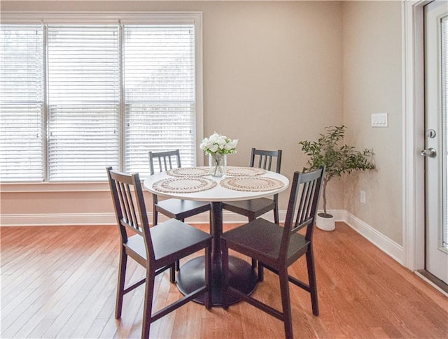55 Little Barley Ln, Grayson, GA 30017 - dining space with baseboards and light wood-type flooring