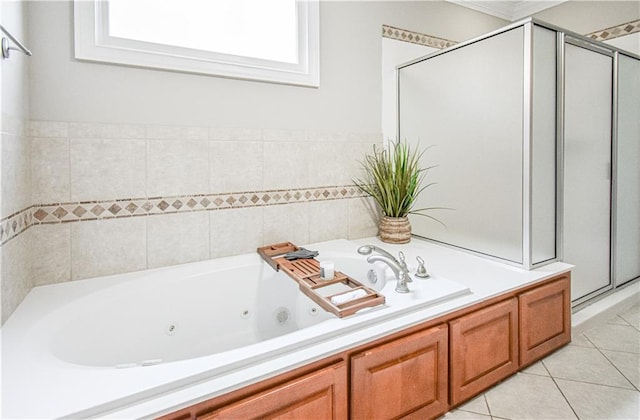 55 Little Barley Ln, Grayson, GA 30017 - bathroom with a shower stall, tile patterned flooring, and a jetted tub