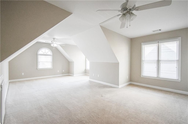 55 Little Barley Ln, Grayson, GA 30017 - additional living space with ceiling fan, carpet flooring, baseboards, and lofted ceiling