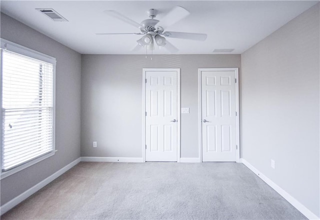 55 Little Barley Ln, Grayson, GA 30017 - unfurnished bedroom with carpet flooring, baseboards, and a ceiling fan