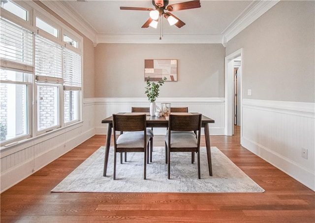 55 Little Barley Ln, Grayson, GA 30017 - dining space featuring ceiling fan, wainscoting, crown molding, and wood finished floors