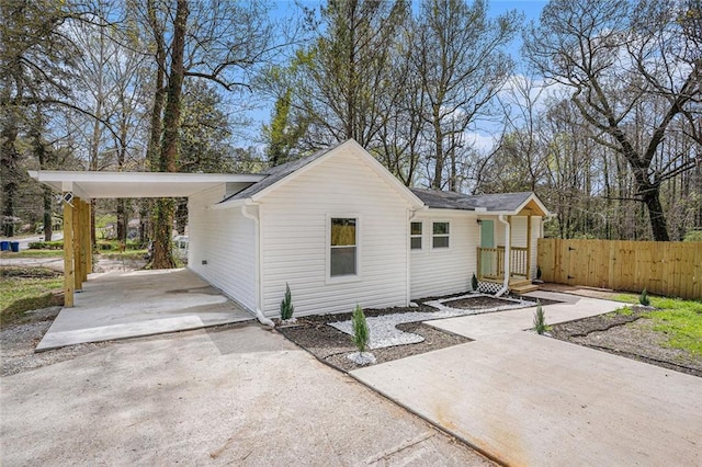 view of front of house featuring a carport