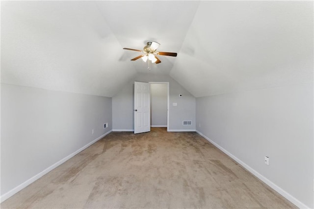 bonus room featuring vaulted ceiling, carpet, visible vents, and baseboards