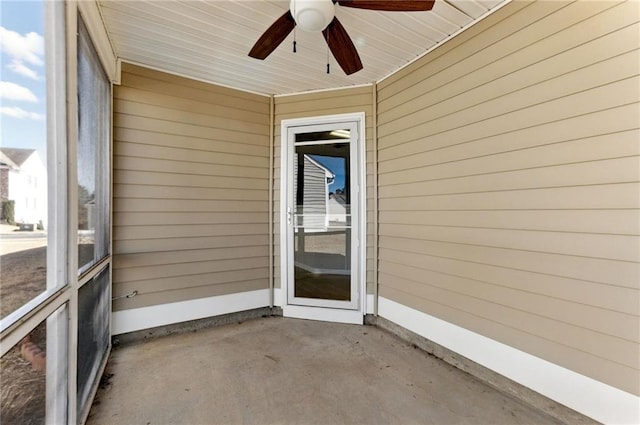 exterior space with a patio area and ceiling fan