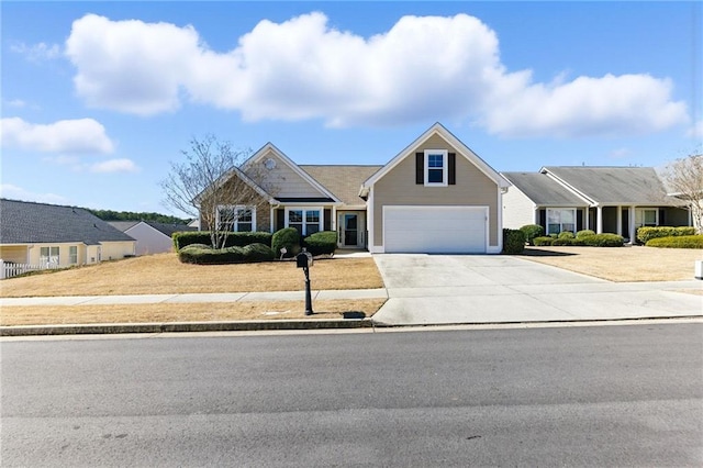 view of front of property with a garage and driveway