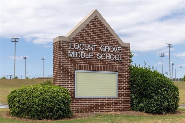 view of community sign