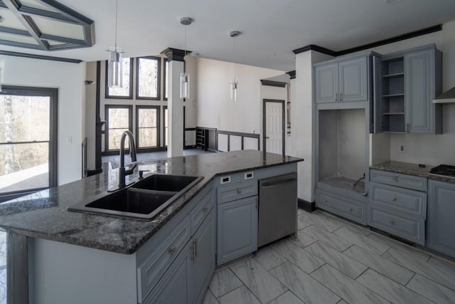 kitchen featuring an island with sink, a sink, pendant lighting, stainless steel dishwasher, and marble finish floor