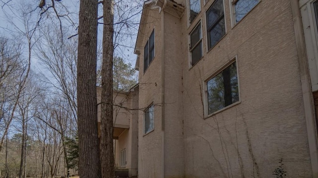 view of property exterior with stucco siding