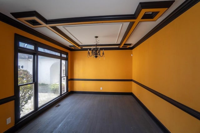 unfurnished room with dark wood finished floors, baseboards, coffered ceiling, and ornamental molding