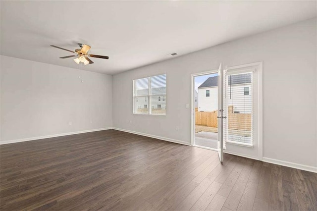339 Elgin Dr, Lawrenceville, GA 30045 - unfurnished room with ceiling fan, baseboards, dark wood-type flooring, and visible vents