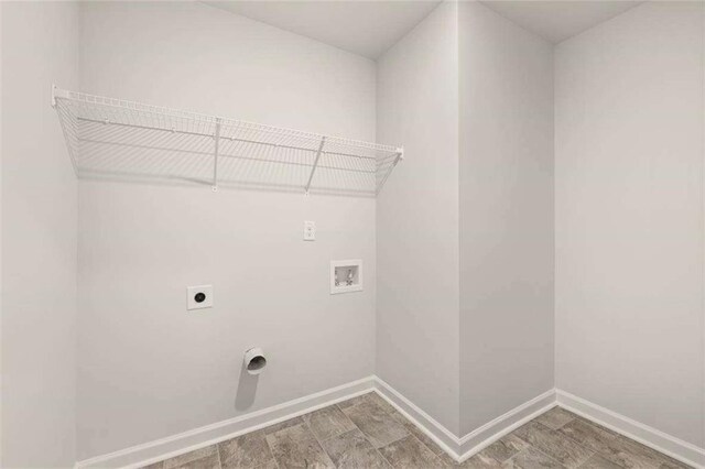 339 Elgin Dr, Lawrenceville, GA 30045 - clothes washing area with electric dryer hookup, hookup for a washing machine, laundry area, and baseboards