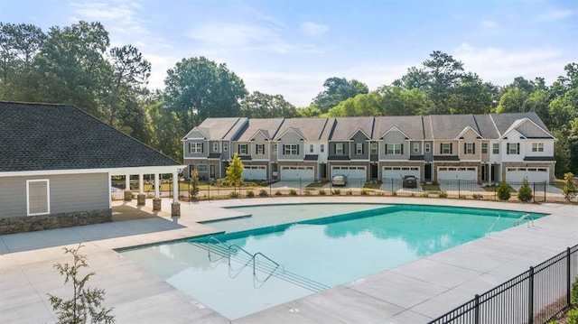 339 Elgin Dr, Lawrenceville, GA 30045 - community pool with a patio and fence